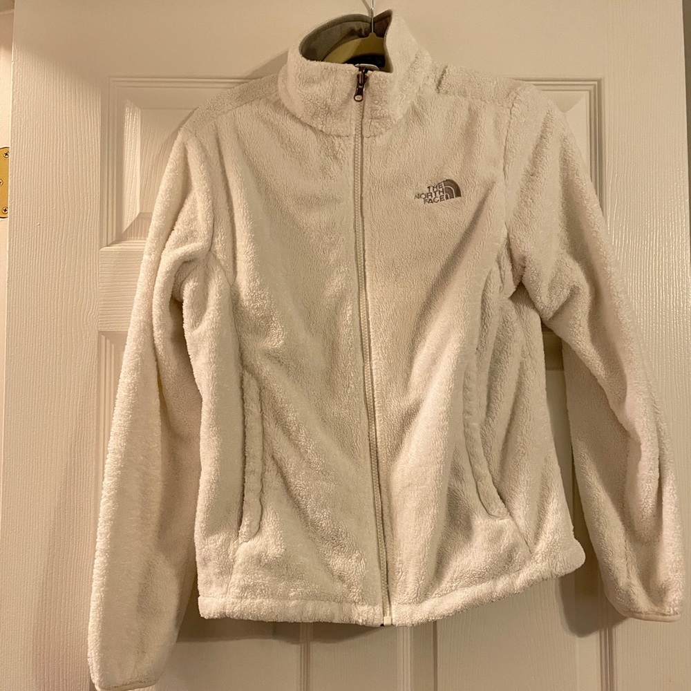 The North Face white zip fleece medium. With zip pockets. Great condition.